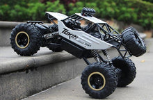 Load image into Gallery viewer, 2.4Ghz 4WD Rock Climber Monster Truck with Free Ninja Dragon Drone
